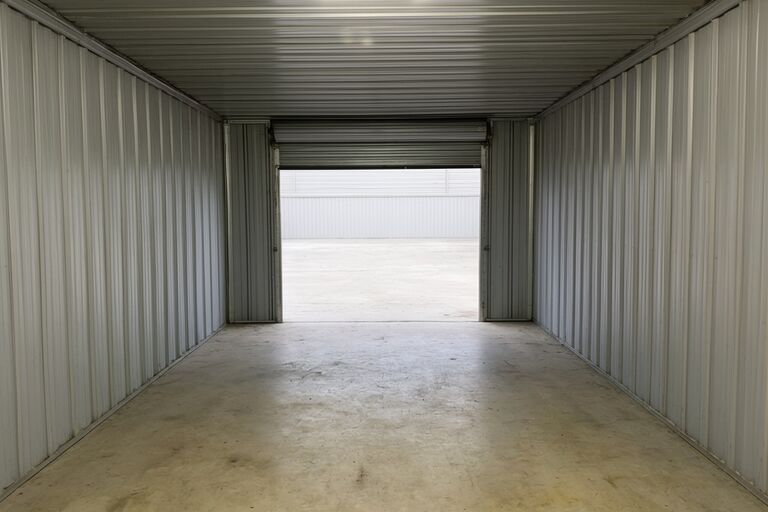 Completely empty clean storage unit after full cleanout with door open